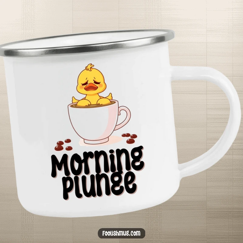 Funny camping mug featuring a rubber ducky struggling in a teacup of coffee, great for outdoor coffee breaks and humor.