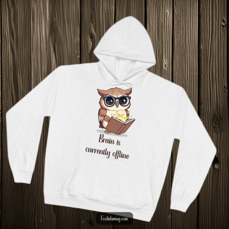 Funny hoodie depicting a confused owl with spectacles, reading a tiny exploding book, a comical and warm gift for laughter lovers.