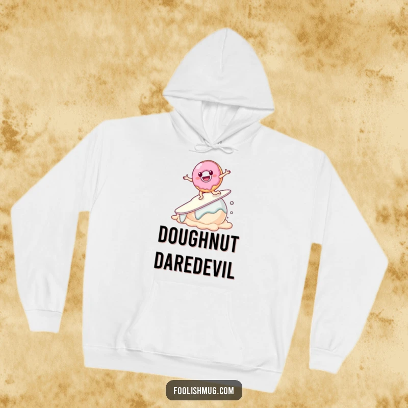 Funny Donut Hoodie, a warm sweatshirt featuring a smiling donut character attempting to surf on a melting scoop of ice cream.