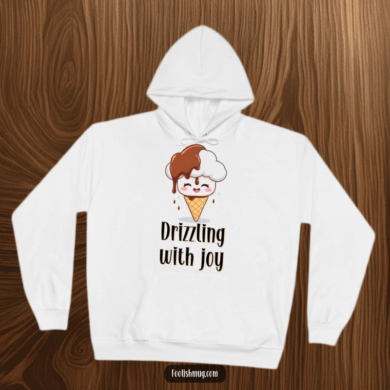 Funny hoodie depicting a giggling cloud character raining chocolate syrup on a confused ice cream cone, cozy and sweet for a funny gift.