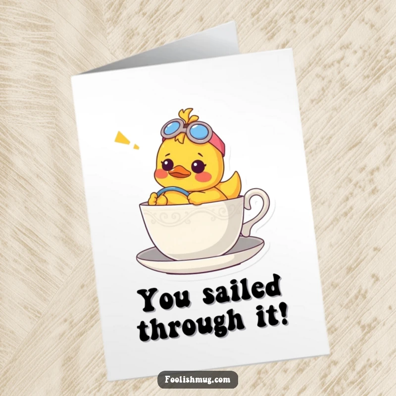 Funny Free Printable Congratulations Card: A rubber ducky looks confused while piloting a teacup boat, celebrating success with humorous charm. Downloadable.