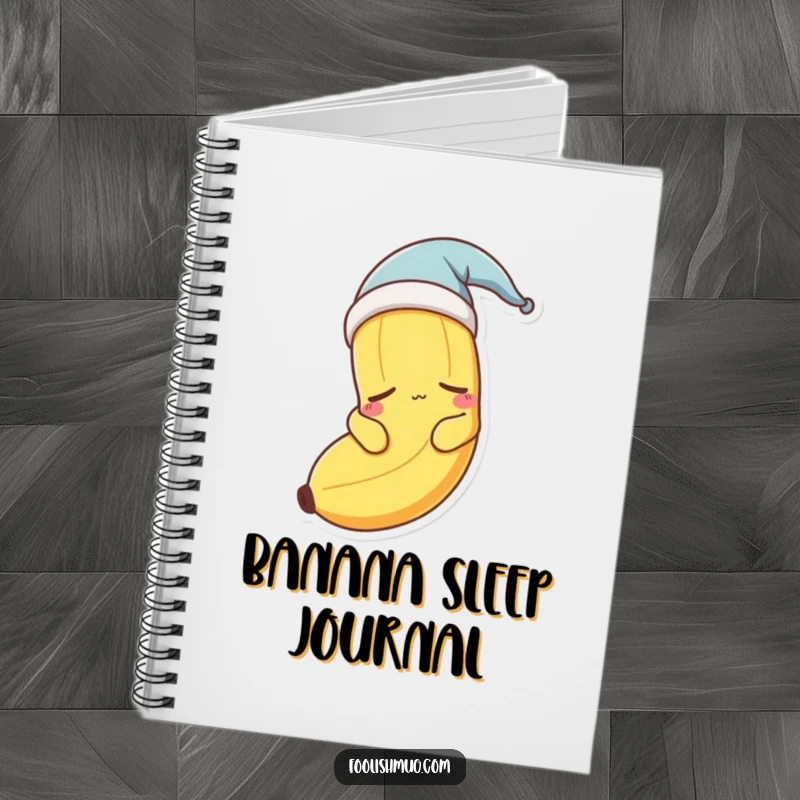 Funny sleepy banana character wearing a nightcap on the cover of a notebook.