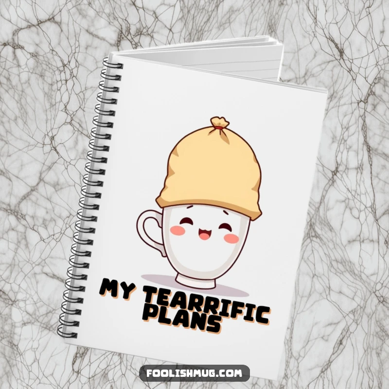 Funny notebook with a playful teacup character wearing a giant teabag as a hat, ideal for writing and as a funny gift.