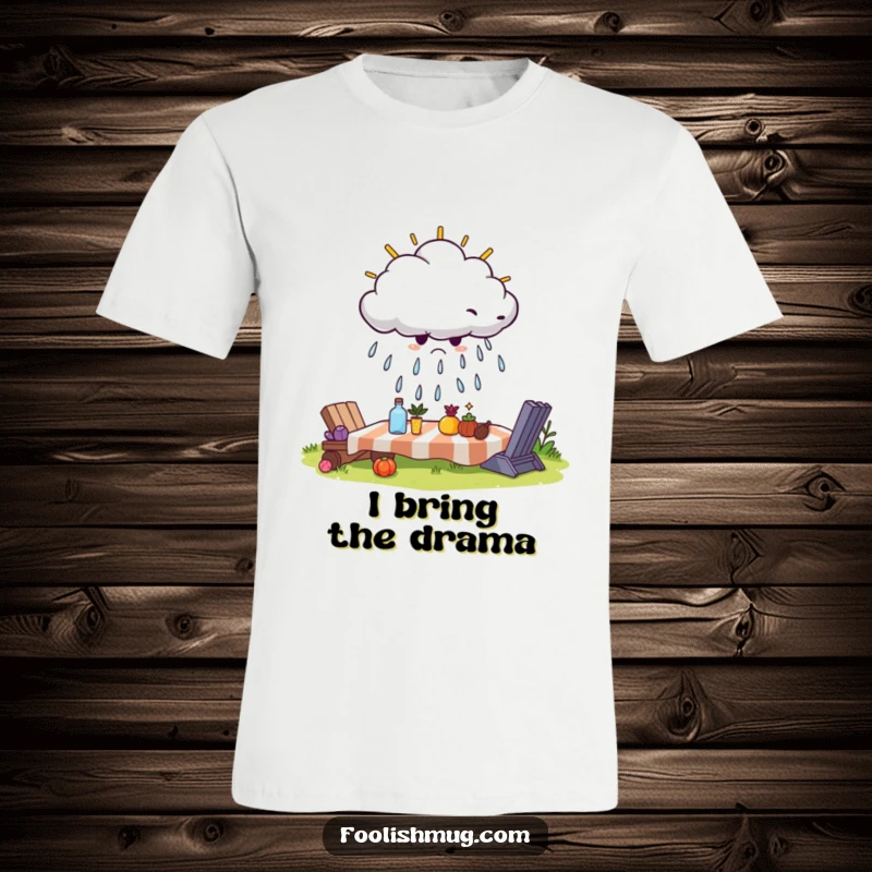 Funny T-shirt depicting a scowling cloud trying to spoil a bright picnic scene with unwanted rain, a humorous protest.