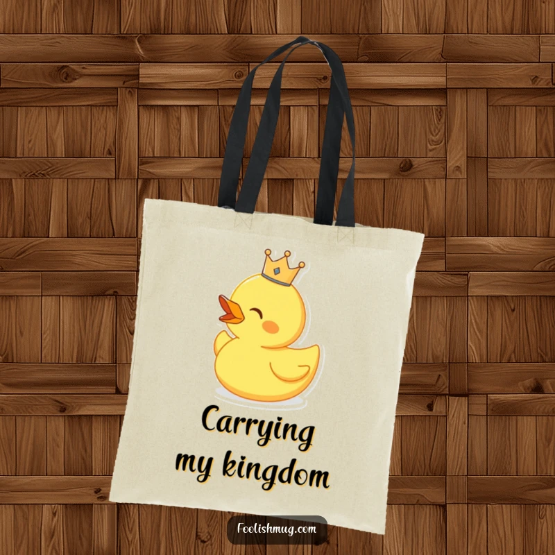 Funny singing rubber duck wearing a tiny crown, on a tote bag, perfect for carrying music or essentials.